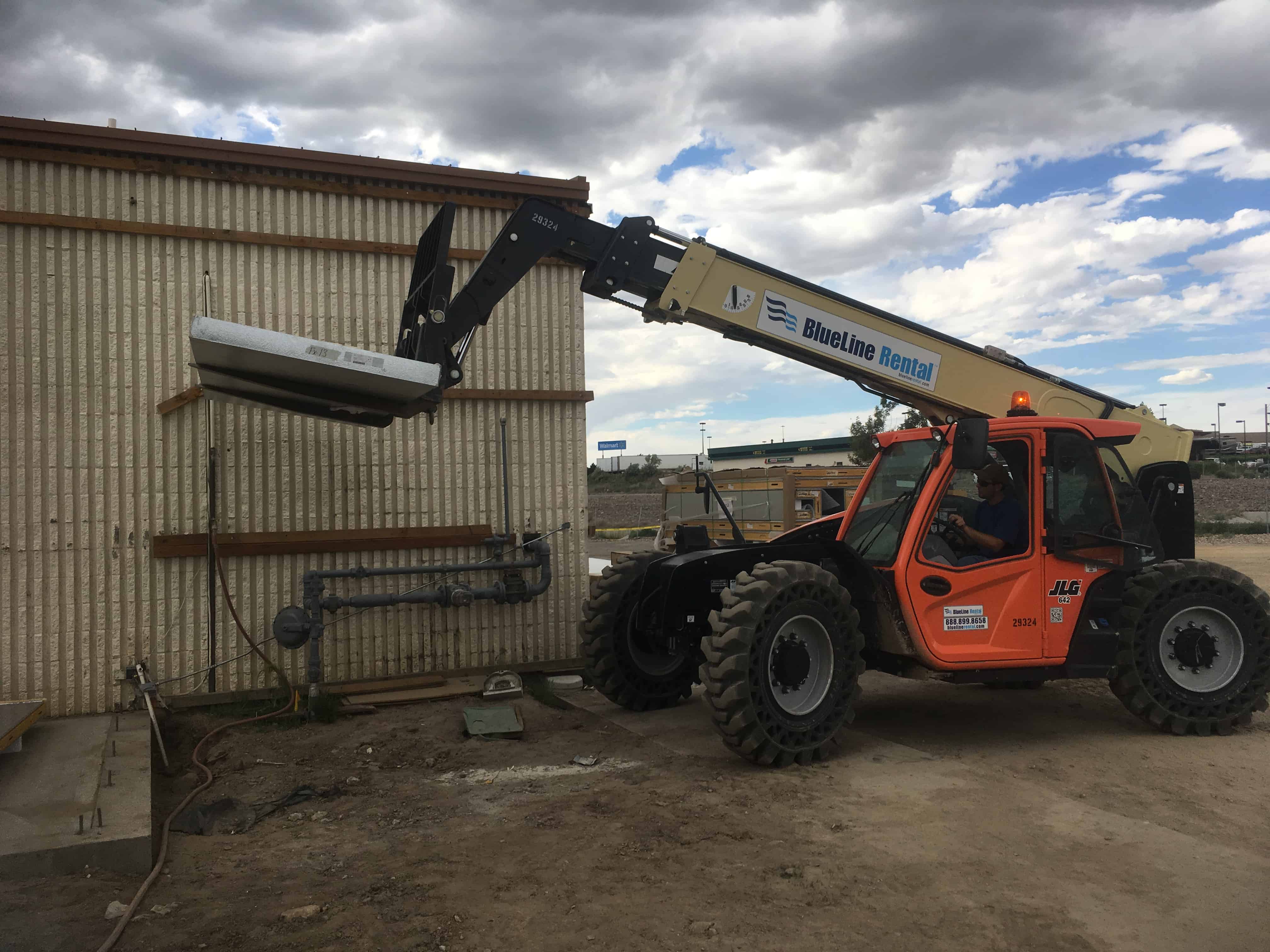 Fork lift moving building material